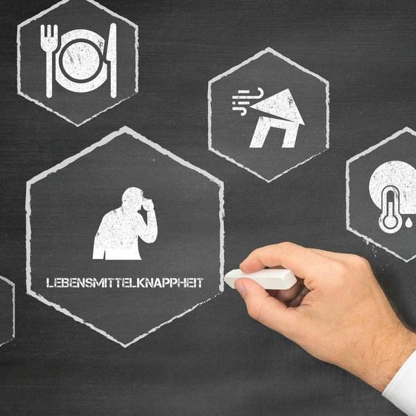 Tafel mit verschiedenen Symbolen zum Thema Lebensmittel