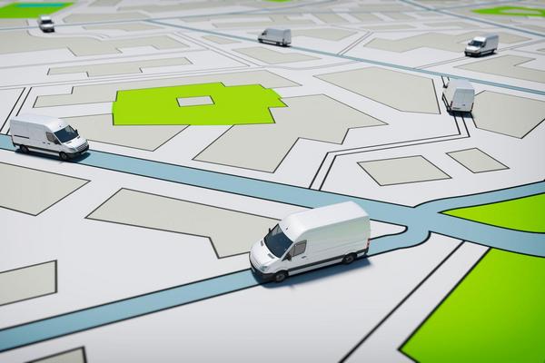 Symbolisches Bild: Straßenkarte bzw. Stadtplan mit Spielzeugautos